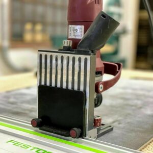 ZetaRail black adapter with two knurled knobs mounting a Lamello Zeta P2 joiner to a Festool guide rail