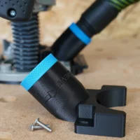 Black hose adapter with blue grip band, shown detached and installed on Bosch 1617 plunge router, includes two stainless steel screws