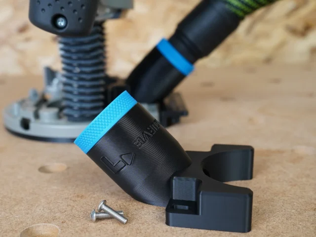 Black hose adapter with blue grip band, shown detached and installed on Bosch 1617 plunge router, includes two stainless steel screws