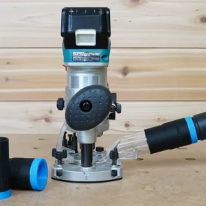 Black ToolCurve hose adapter with blue band connecting a vacuum hose to a Makita plunge router dust port, plus a spare adapter alongside