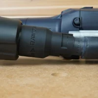 Black plastic Dewalt Quick Connect hose adapter with 27mm and 36mm ports, mounted on a Festool tool with hose attached