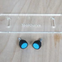 Clear acrylic guide rail square support tab with numbered scale 10-14, two black knobs with blue centers and threaded metal studs for mounting