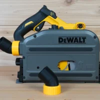 ToolCurve No Snag Dust Port adapter attached to a DeWalt track saw, with yellow angled hose connector and twist-lock adapter shown separately