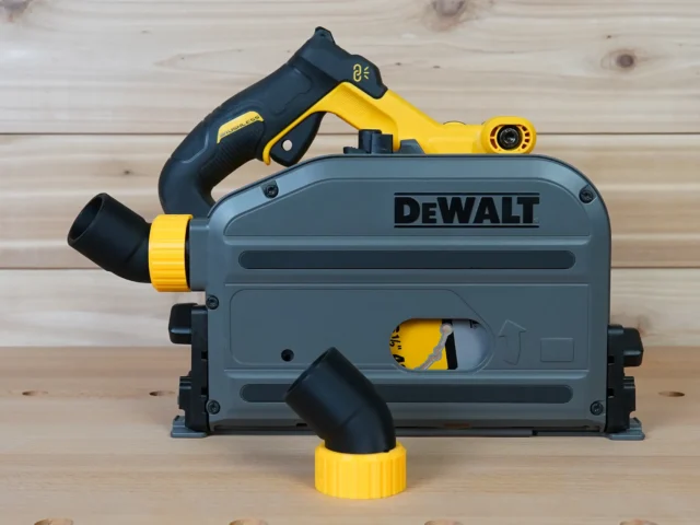 ToolCurve No Snag Dust Port adapter attached to a DeWalt track saw, with yellow angled hose connector and twist-lock adapter shown separately