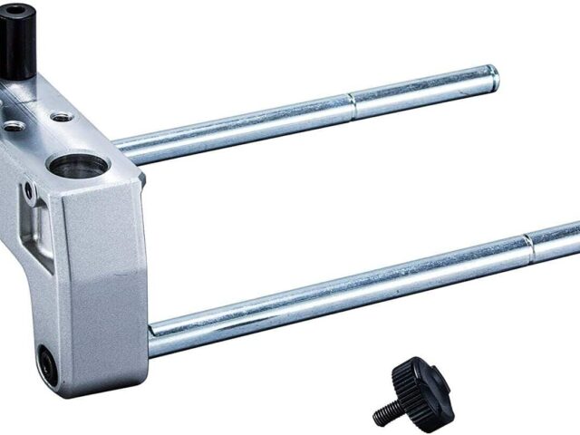 Makita LS610DZ miter saw with two aluminum extension arms and black knob adjuster, shown from side angle