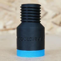 Black plastic hose adapter with threaded top and blue knurled grip band at base, labeled ToolCurve