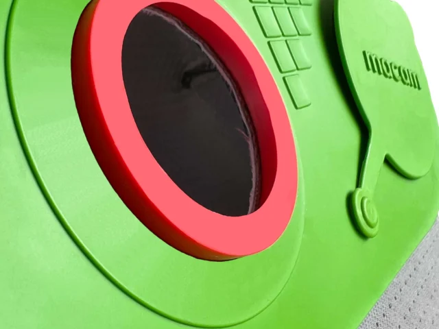 Macam reusable filter bag for Festool CT Midi dust extractor, green with red collar and black inner membrane, close-up of oval inlet opening