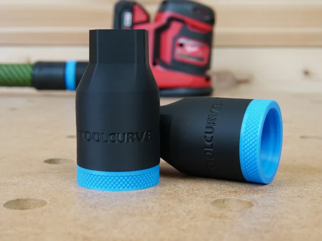 Two black hose adapters with blue grip rings, one showing the tapered end and the other the open connector end, marked with ToolCurve branding
