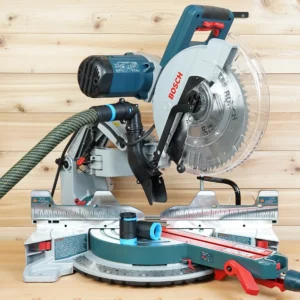 Black hose adapter with blue collar connecting a dust extractor hose to a Bosch 12-inch glide miter saw dust port
