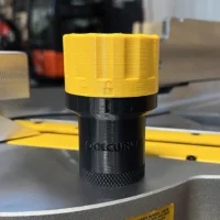 Yellow and black hose adapter with knurled grip base, labeled for Dewalt Quick Connect ports, displayed standing upright on a workshop surface