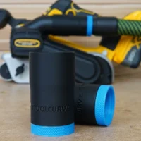 Black hose adapter with blue grip bands for Dewalt belt sander, shown disassembled in foreground with sander blurred in background