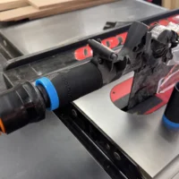 Cast iron Table Saw stop stop hose adapter to use your dust collection shop vac and 1-1/4" hose