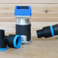 Black 36mm hose adapter with blue collar beside a Kobalt 24v router, second adapter joining a hose
