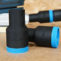 Three black hose adapters with blue grip bands labeled ToolCurve, shown standing and laying on a workbench