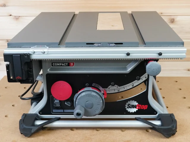 Zero clearance insert mounted on a SawStop Compact table saw, showing the MDF insert fitted flush with the saw table