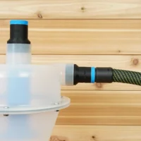 Hose adapter with blue knurled grip and black body connected to a Cen-Tec Quick-Click separator and yellow-green braided hose