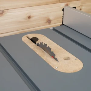 MDF zero clearance insert installed flush in a gray Milwaukee M18 table saw table with blade raised through the slot