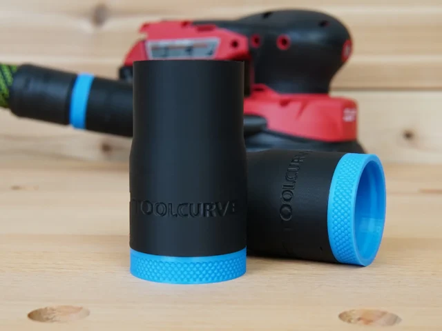 Black ToolCurve hose adapter with blue grip ring, shown standalone and attached to Milwaukee Fuel sander in background
