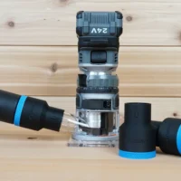 Black 36mm hose adapter with blue band on a green hose, connected to a FLEX 24v router, plus two spare adapters