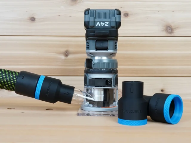 Black 36mm hose adapter with blue band on a green hose, connected to a FLEX 24v router, plus two spare adapters
