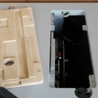 Natural MDF zero clearance insert with routed pockets and mounting holes for Bosch GTS18 table saw, shown left; right shows insert mounted in saw with stainless offset screws visible