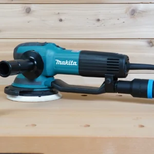 Black hose adapter with blue band joining an extractor hose to a Makita random orbit sander, second adapter alongside