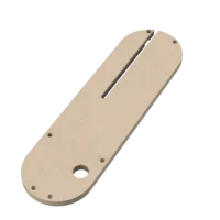 Tan 3D-printed zero clearance insert with centered slot, mounting holes, and rounded ends for SawStop table saws