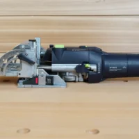 DF 500 Imperial Thickness Gauge mounted on a Festool Domino joiner, showing the numbered dial with imperial board thickness settings and bright green indicator