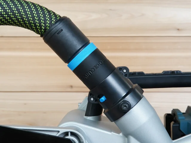 Black hose adapter with blue band attached to Bosch 18v miter saw dust port, green and black rope hose connected above