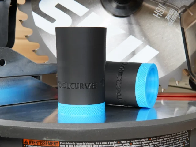 Black and bright blue hose adapter for SKIL 10" miter saw, shown in two orientations on a workbench