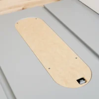 Dado zero clearance MDF insert seated uncut in a SawStop Jobsite PRO table saw with adjustment screws