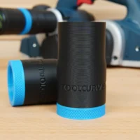 Black cylindrical hose adapter with blue grip band and ToolCurve branding, shown standalone and in background installed on a Bosch planer