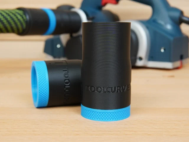 Black cylindrical hose adapter with blue grip band and ToolCurve branding, shown standalone and in background installed on a Bosch planer