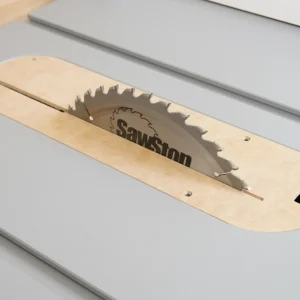 MDF zero clearance insert seated in a SawStop Jobsite PRO table saw with the blade raised through the slot