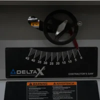 Zero clearance insert installed in Delta Unisaw X5 table saw, viewed from above showing blade opening and angle gauge