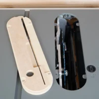 Two zero clearance inserts for Hercules 10" table saw: cream-colored MDF insert shown from above displaying a central slot and mounting holes, and dark assembled insert installed in saw showing internal blade channels