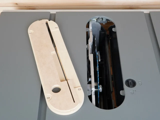Two zero clearance inserts for Hercules 10" table saw: cream-colored MDF insert shown from above displaying a central slot and mounting holes, and dark assembled insert installed in saw showing internal blade channels