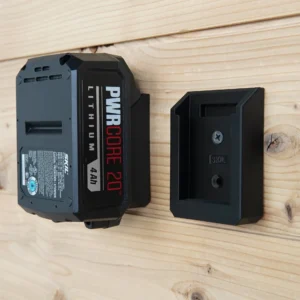 Two black SKIL battery mounts screwed to a wood wall, one holding a PWRCORE 20 4Ah battery, one empty