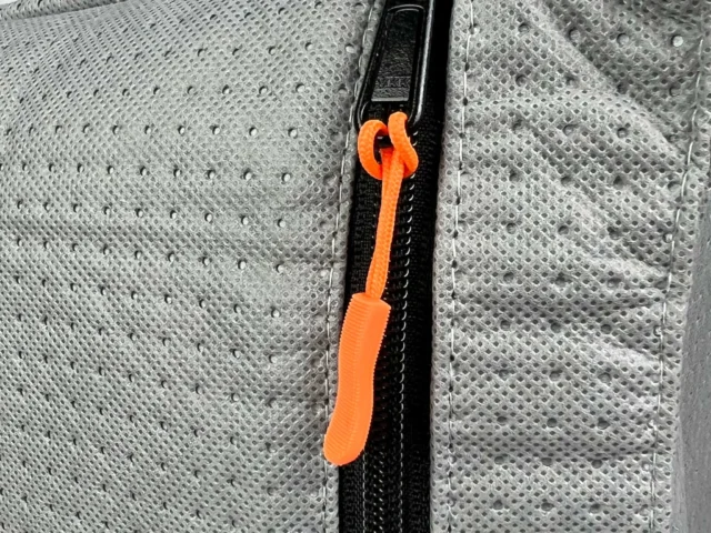 Macam reusable filter bag for Festool CT 48 with black zipper and orange pull tab, shown installed on mesh dust extractor fabric