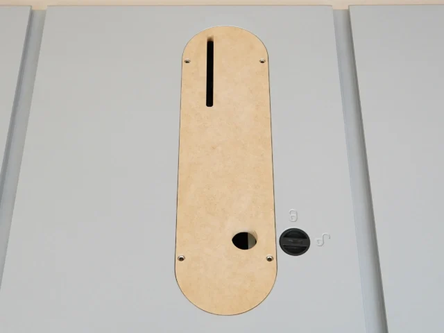 Tan MDF zero clearance insert for Kobalt 10″ table saw, top view showing vertical slot, oval opening, and mounting holes