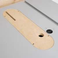 MDF zero clearance insert for Kobalt 10″ table saw, shown from above with slot and circular opening visible