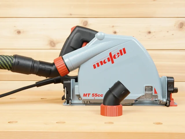 No Snag Dust Port adapter installed on Mafell MT 55cc track saw, with hose attached angled upward to prevent snagging