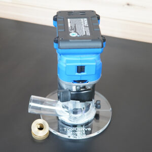 6-inch round acrylic base plate for Kobalt trim router, shown installed on router with brass guide bushing adapter alongside