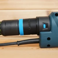 Hose adapter attached to Bosch drywall sander dust port, with 27mm Festool hose and blue identification band