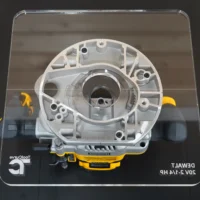 10-inch square clear acrylic router base plate attached to a Dewalt 20v 2-1/4 HP cordless router, overhead view showing wide opening and mounting holes