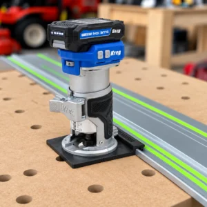 Kreg 20V trim router and battery on a black ToolCurve guide rail adapter attached to a silver track, landscape product rendering